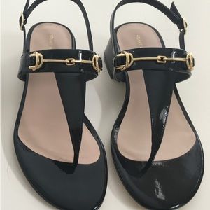 Worn one Stuart Weitzman black sandals